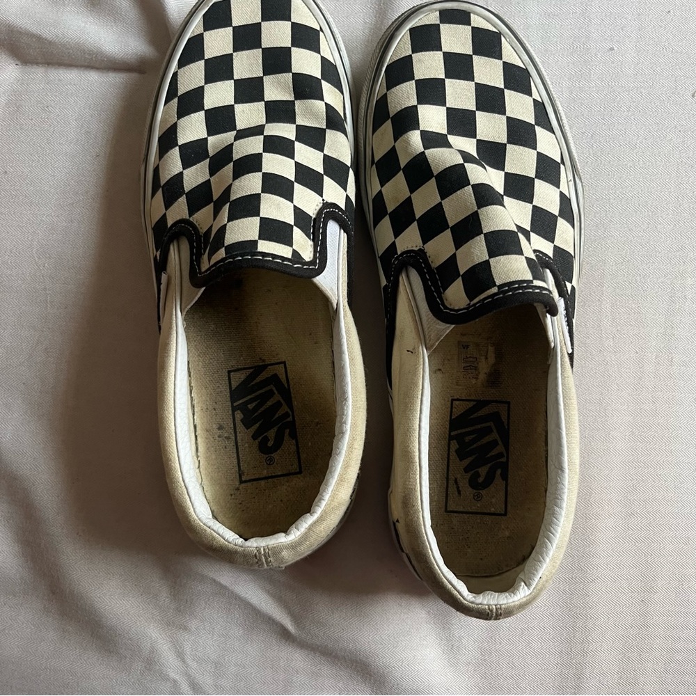 Vans checkered slip ons